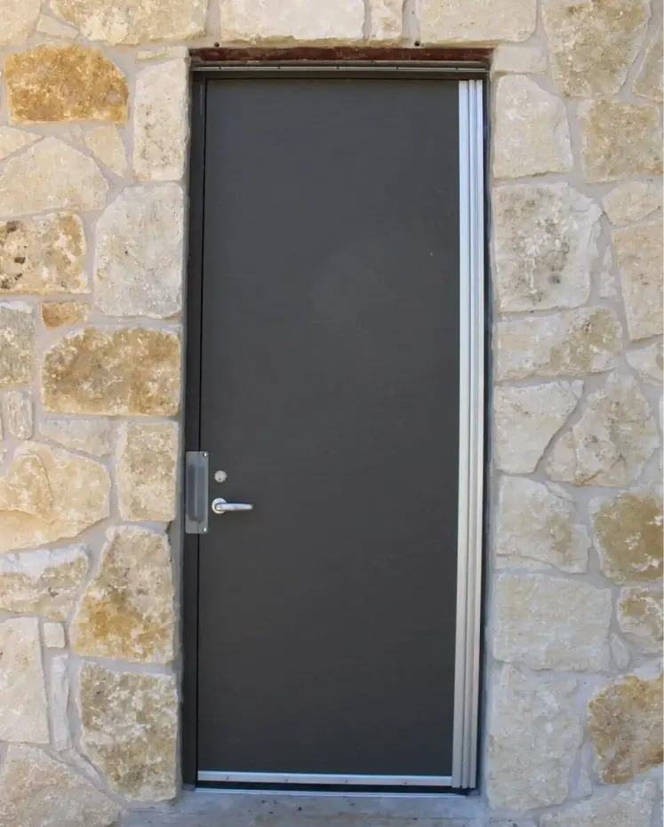 Metal door stone wall entrance
