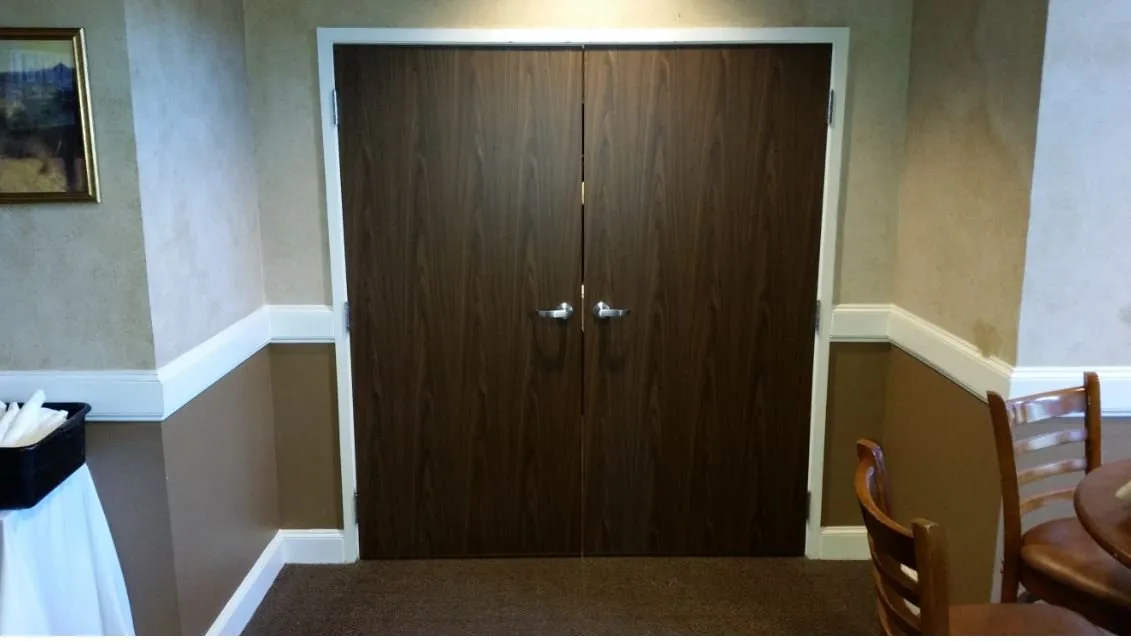 Brown wooden double doors repair