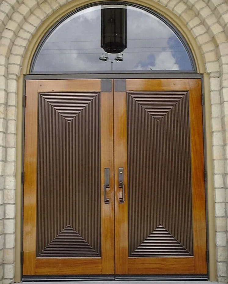 Large elegant wooden entry doors